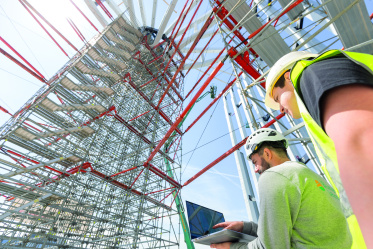 Nicht alltäglich: Gerüstunterstützung für Holzbau in 32 Meter Höhe