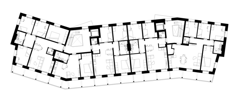 Grundriss des Mehrfamilienhauses in Ingolstadt: Die polygonale Gebäudeform sorgt für eine optimale Belichtung aller Räume. Massive Außenwände und kompakt gestaltete Wohnungen ermöglichen eine effiziente Raumnutzung und tragen zur passiven Temperierung bei. Grundriss: nbundm* Architekten
